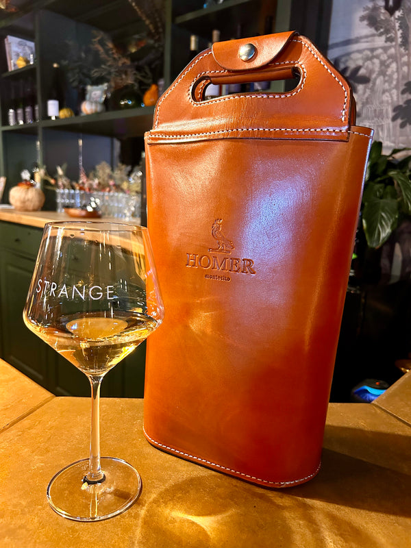 Wine glass and wine bottle
Bag on counter 