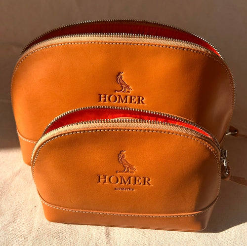 Handcrafted leather cosmetic case with zipper and waterproof interior