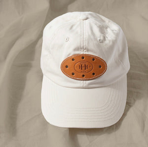 Canvas hat that has a patch says Homer Maker Montecito